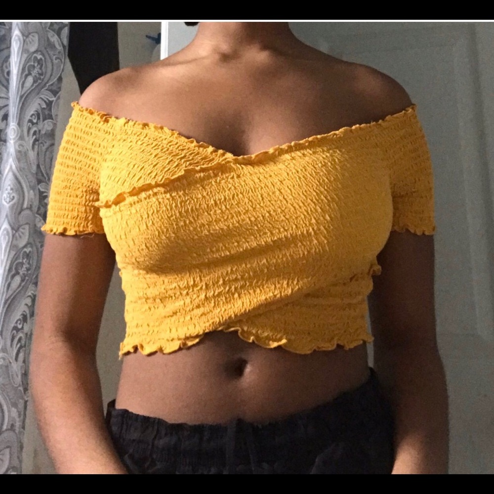 Selling a yellow crop top.